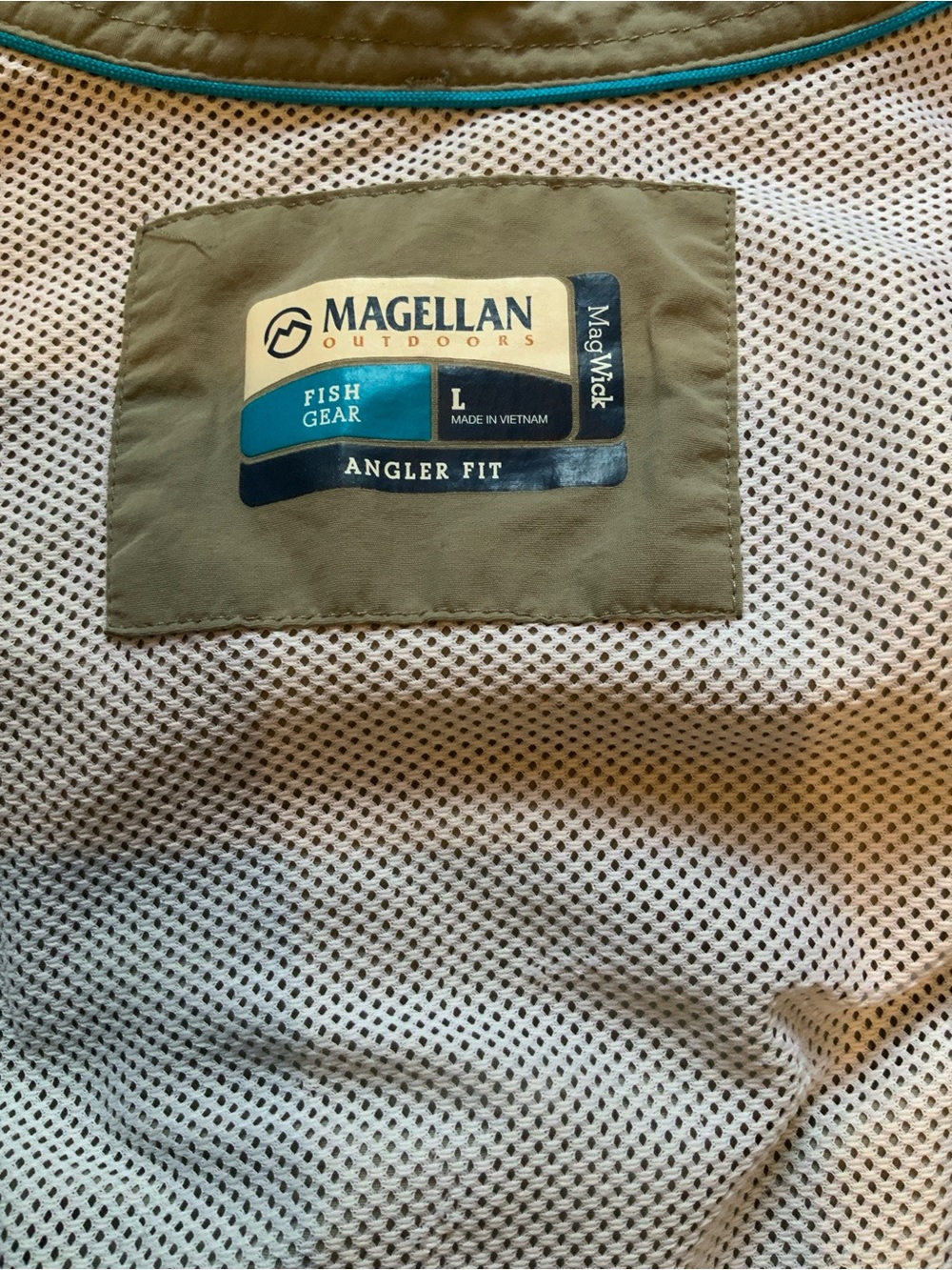 Magellan Outdoors Angler Fit Vest in Beige with Teal Trim